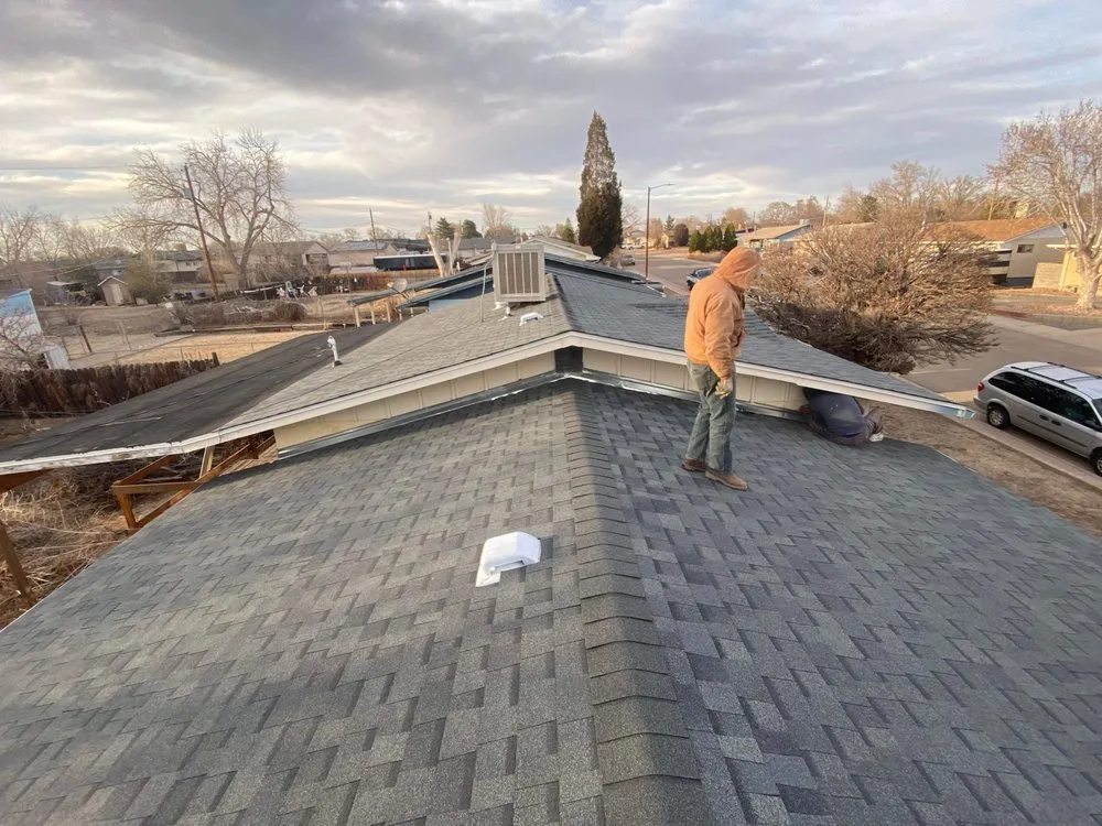 Slide of Triple J Roofing