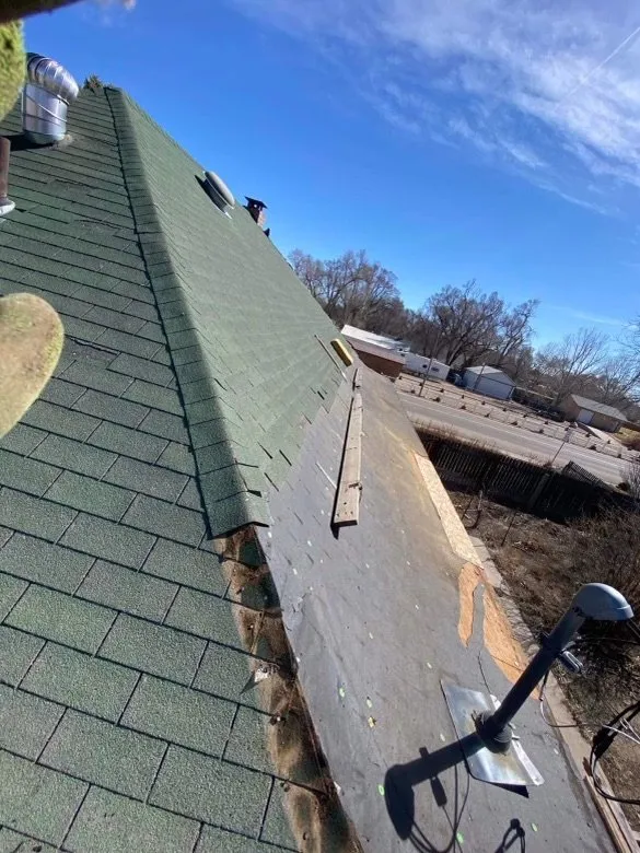 Slide of Triple J Roofing