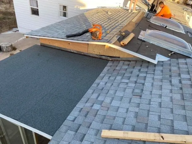 Slide of Triple J Roofing