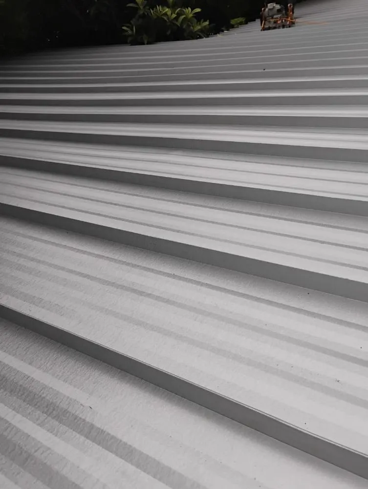 Slide of Triple J Roofing