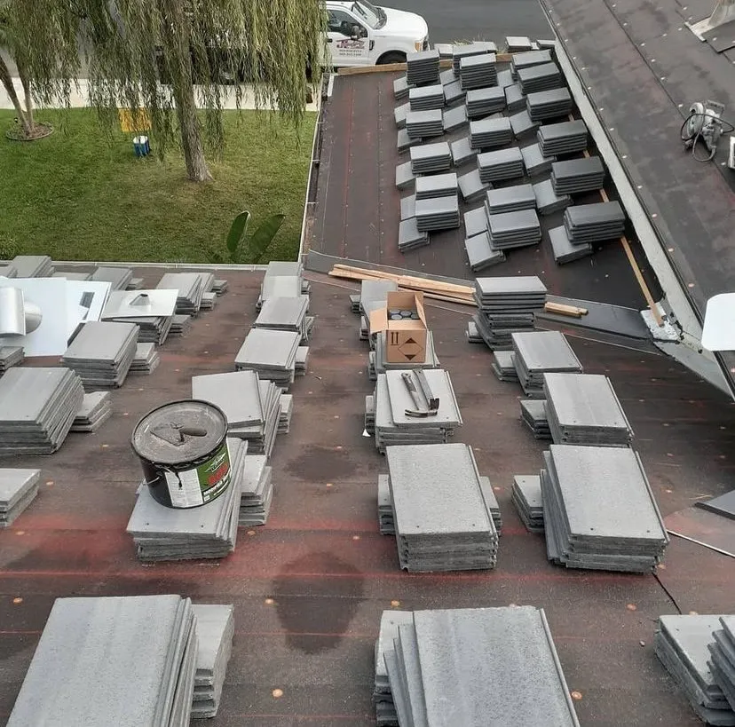 Slide of Triple M Roofing