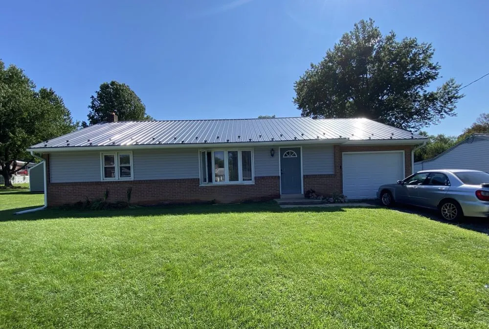 Licensed storm damage roof repair with free inspection in Delta, PA by Triple Trade Construction
