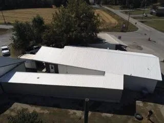 Slide of Triple Zero Roofing