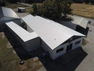 Slide of Triple Zero Roofing