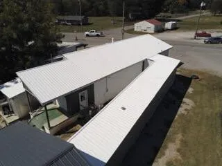 Slide of Triple Zero Roofing