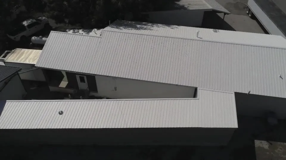 Slide of Triple Zero Roofing