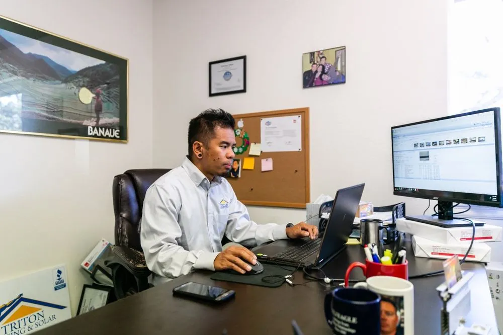 Slide of Triton Roofing