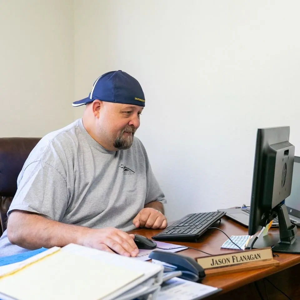 Slide of Triton Roofing