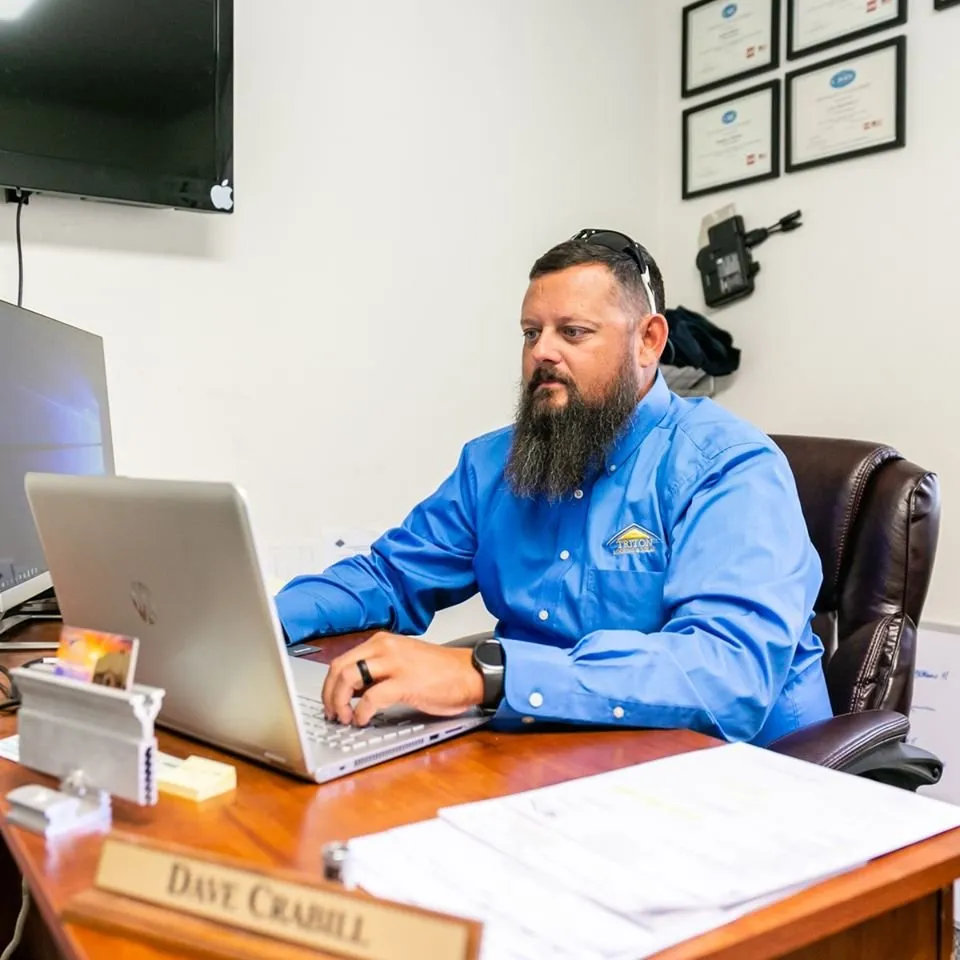 Slide of Triton Roofing