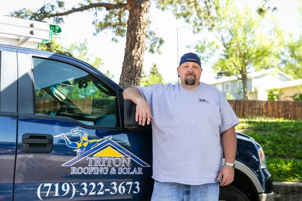 Slide of Triton Roofing