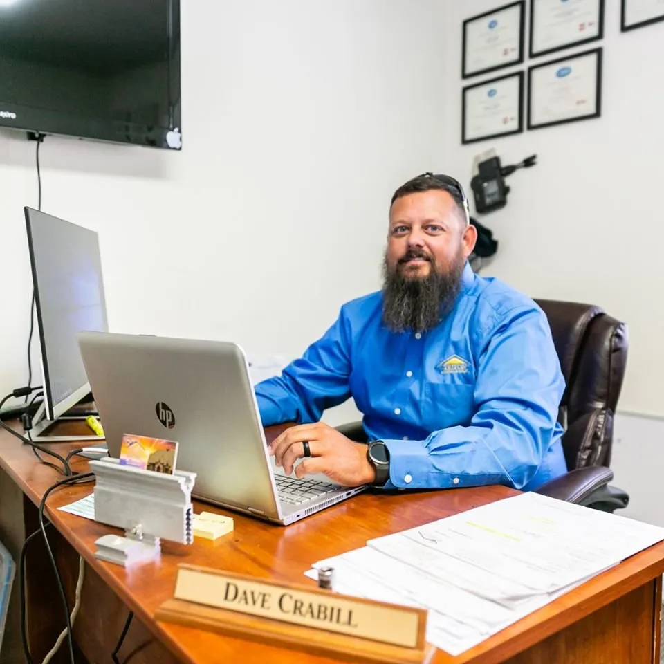 Slide of Triton Roofing