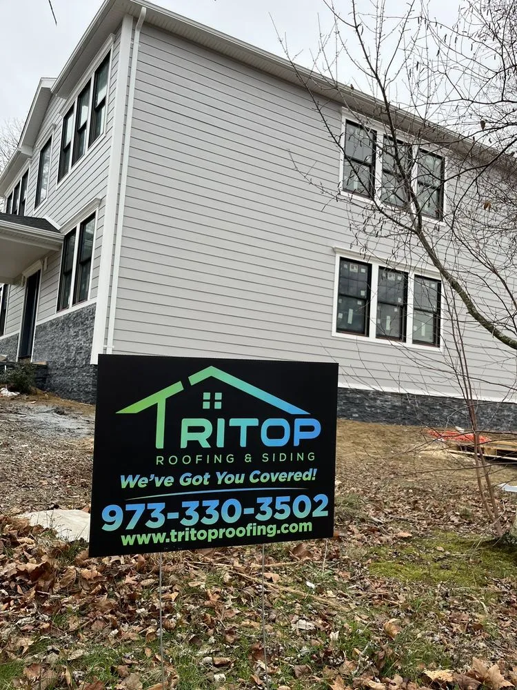 Slide of Tritop Roofing and Siding