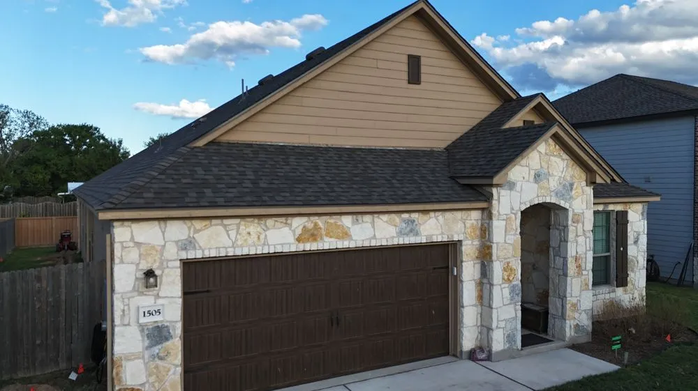 Slide of Triumph Roofing and Restoration