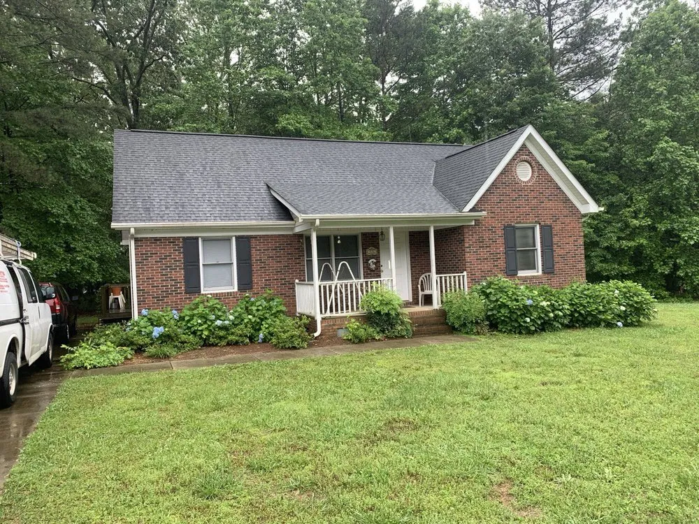 Slide of Triumph Roofing