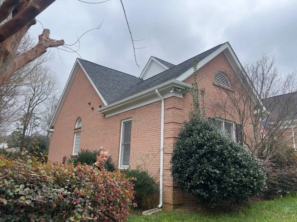 Slide of Triumph Roofing