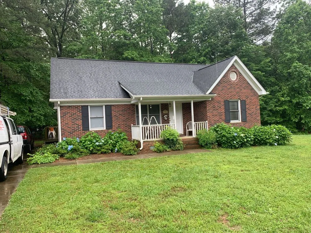 Slide of Triumph Roofing