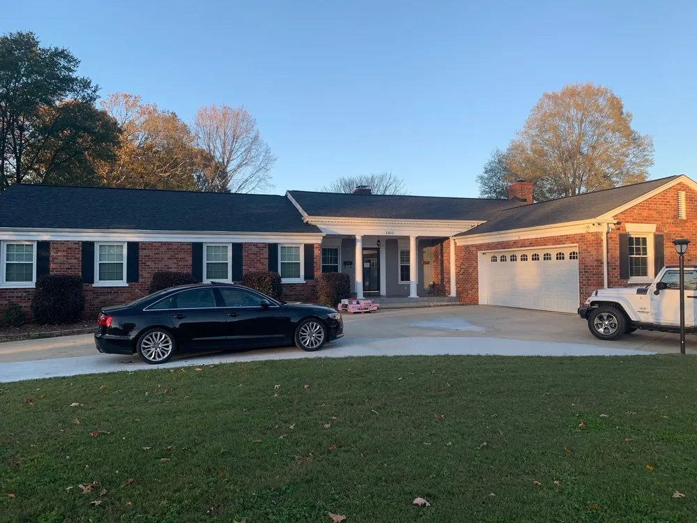 Slide of Triumph Roofing