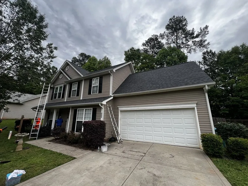 Slide of Triumph Roofing