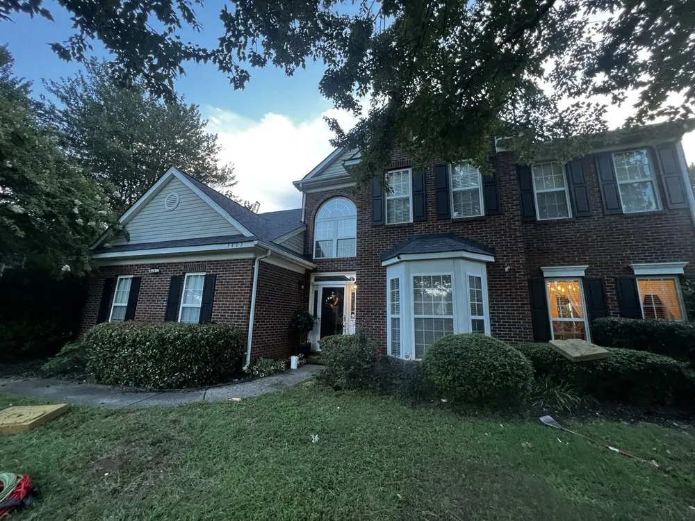 Slide of Triumph Roofing