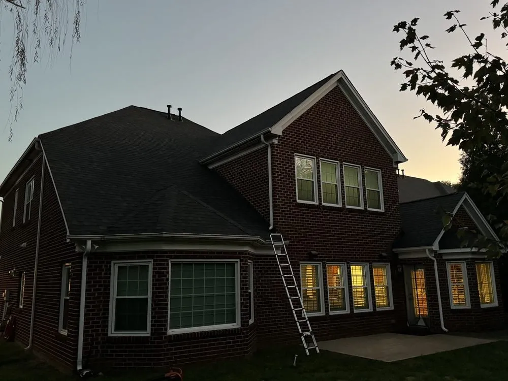 Slide of Triumph Roofing