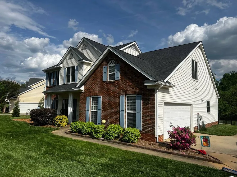 Slide of Triumph Roofing