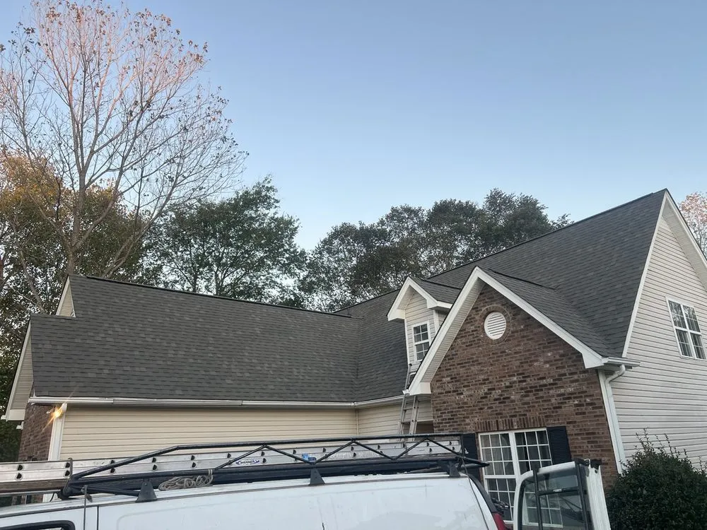 Slide of Triumph Roofing