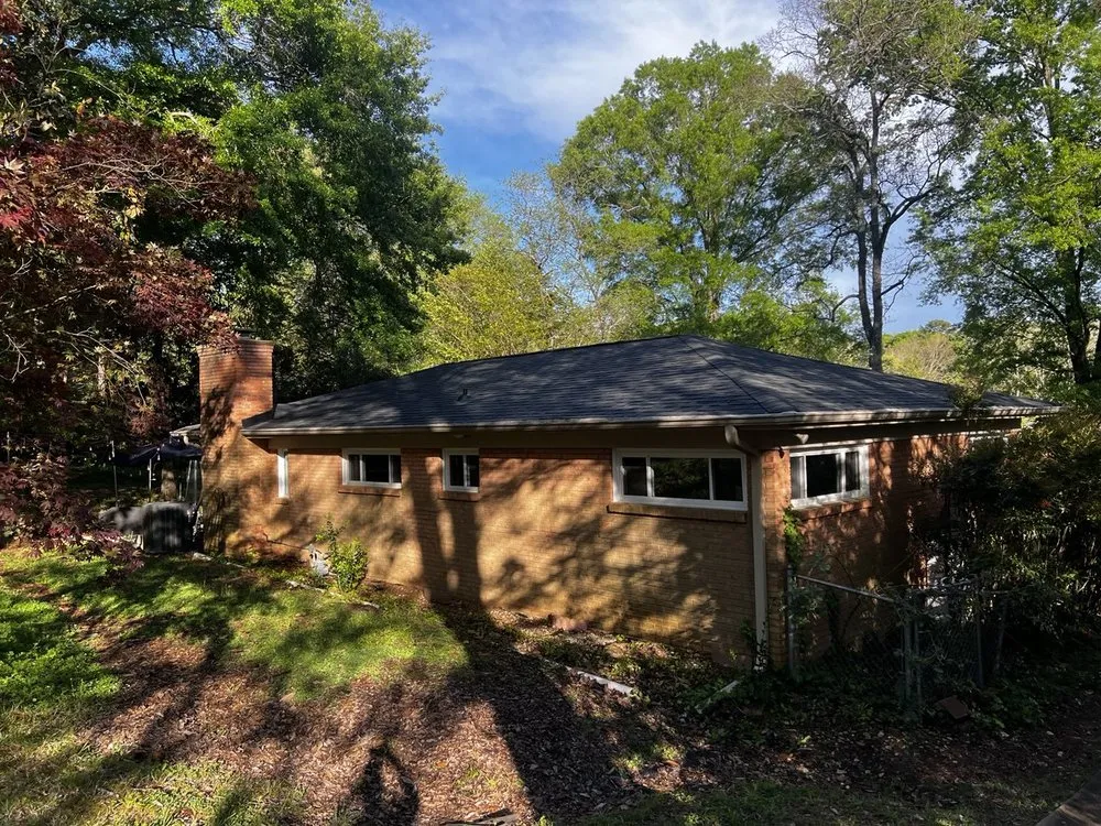 Slide of Triumph Roofing