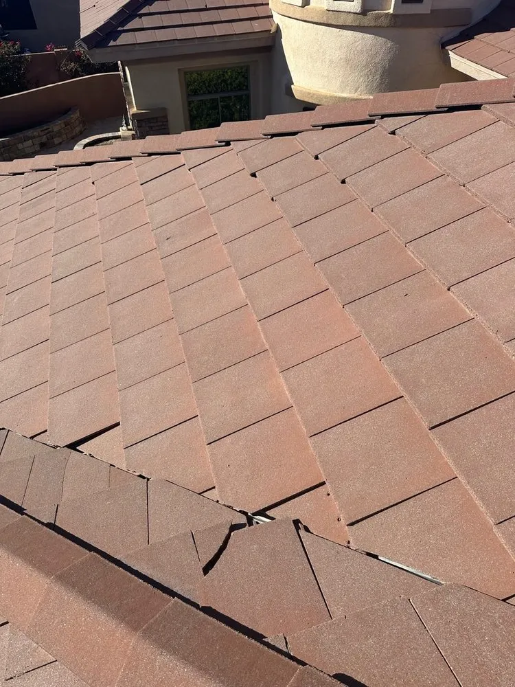 Slide of Triumph Roofing