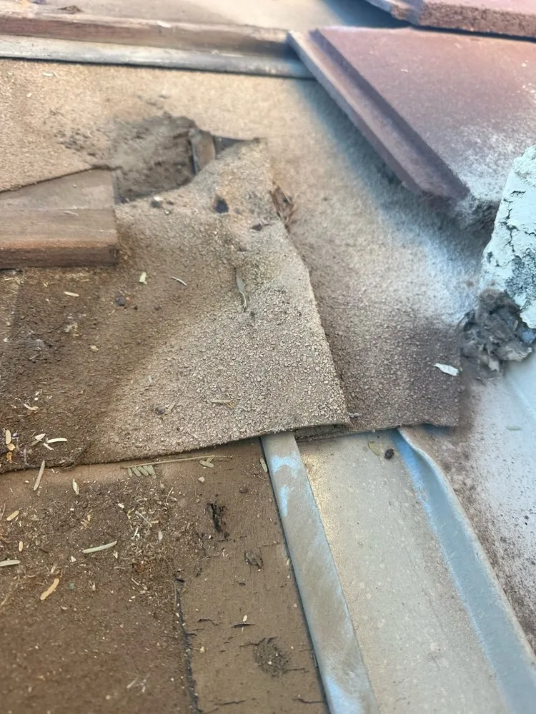 Slide of Triumph Roofing