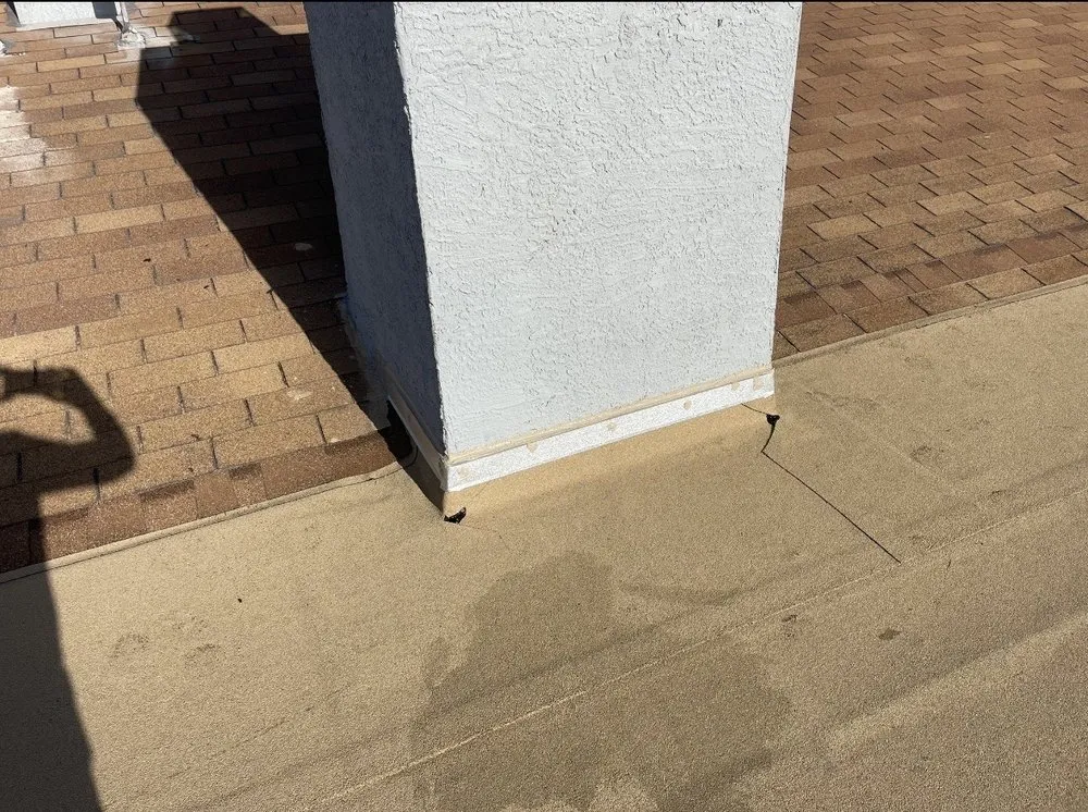 Slide of Triumph Roofing