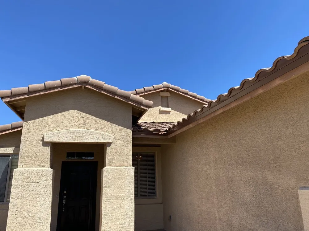 Slide of Triumph Roofing