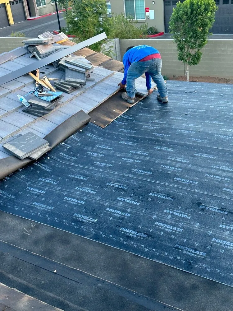 Slide of Triumph Roofing