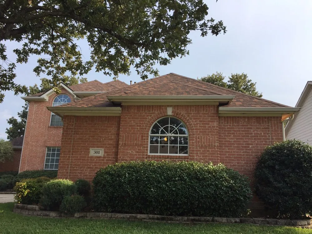 Slide of Triumph Roofing