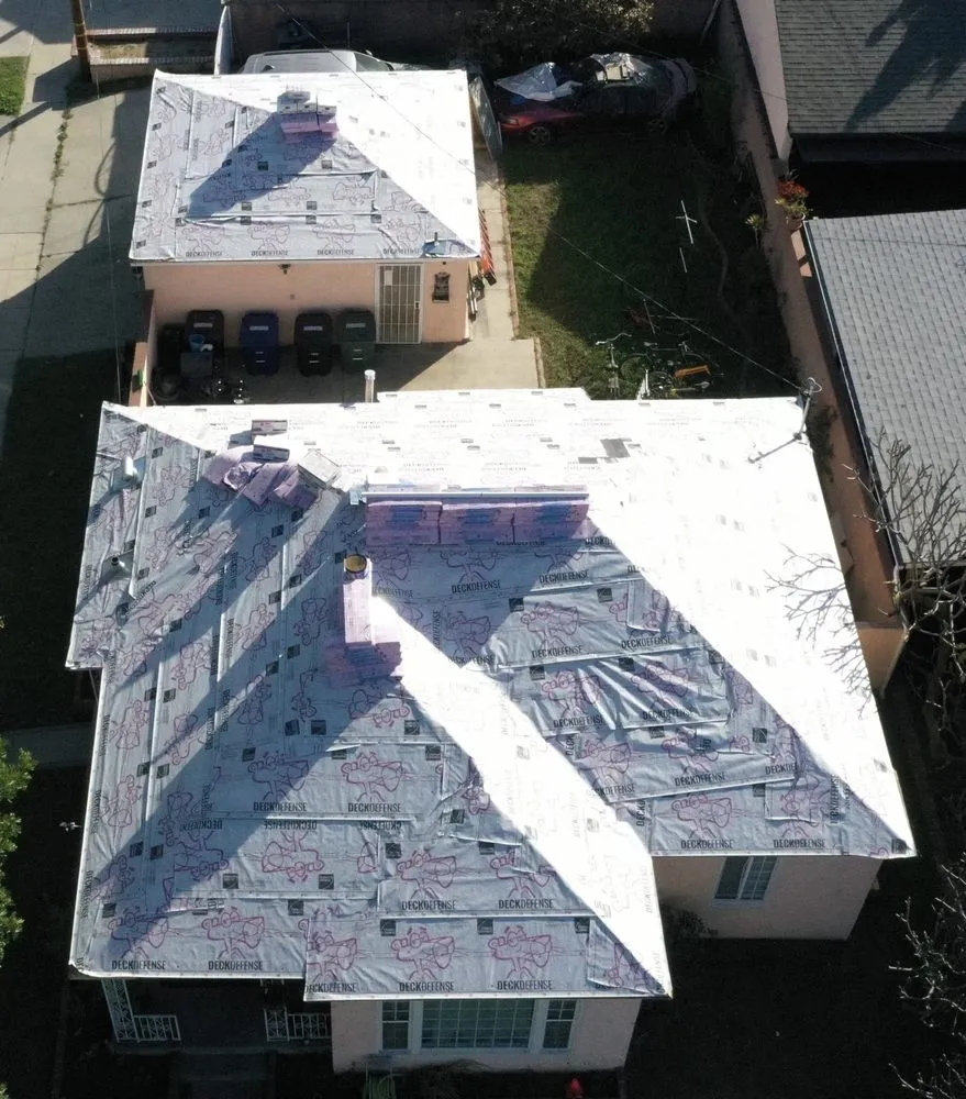 Slide of Trmj Roofing