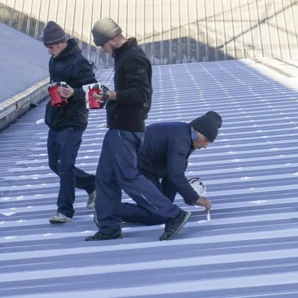 Slide of Troyer Commercial Roofing