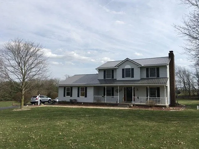 Slide of Troyer Roofing & Construction