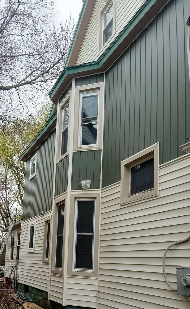 Slide of Troyer Roofing