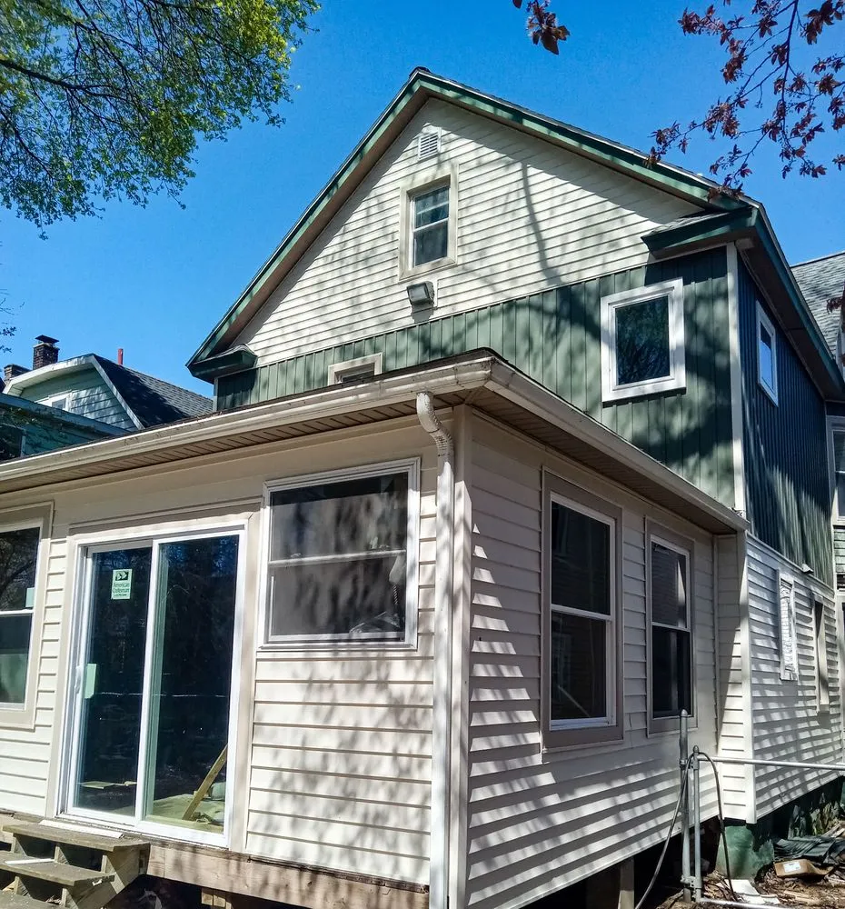 Slide of Troyer Roofing