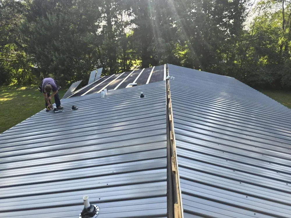 Professional roof installation experts serving Mechanicstown, OH - Troyers Seamless Gutters & Metal Roofing
