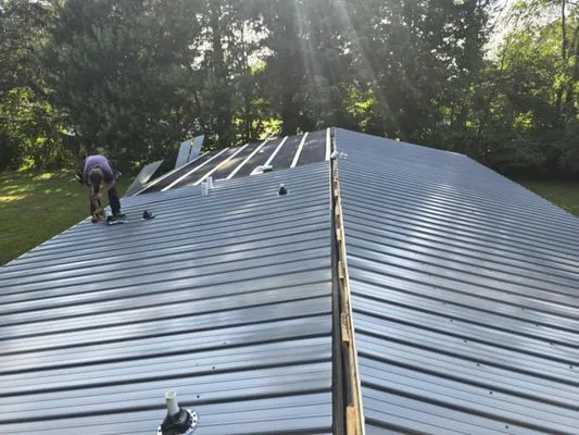 Troyers Seamless Gutters & Metal Roofing Logo