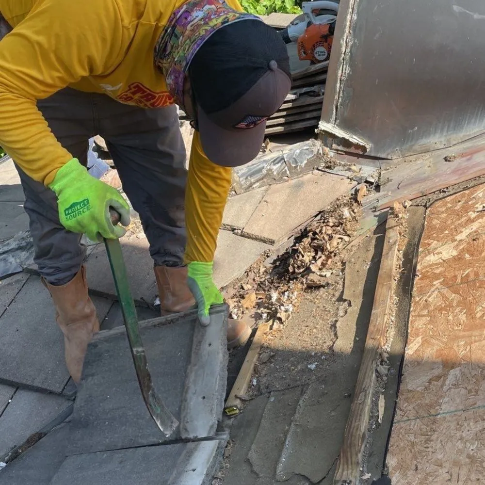 Slide of True Grit Roofing Company