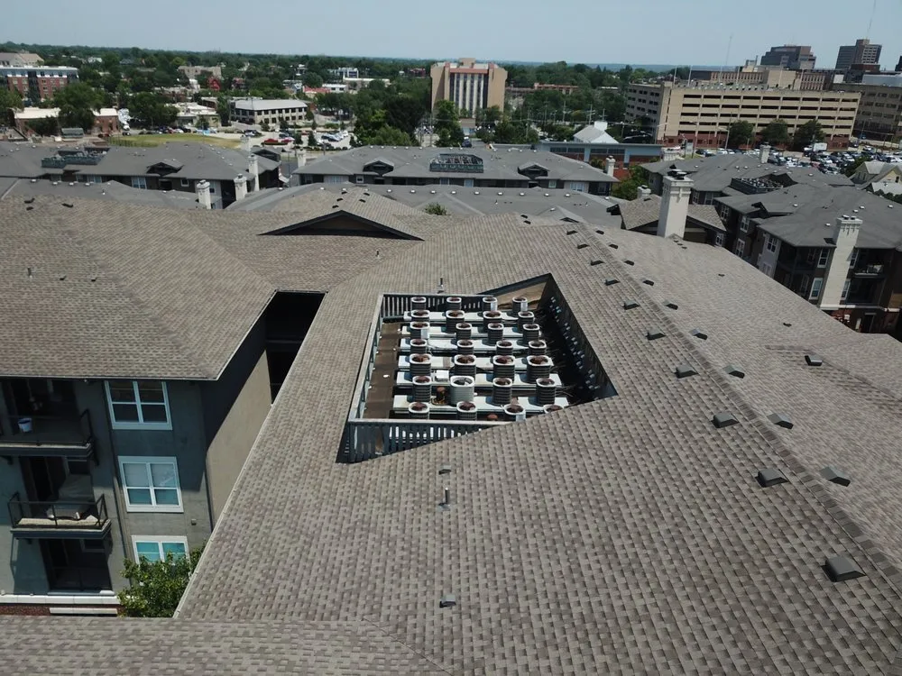 Slide of True Grit Roofing Company