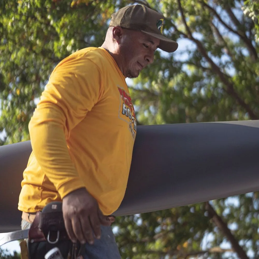 Slide of True Grit Roofing Company