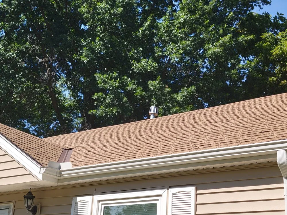 Slide of True Grit Roofing Company