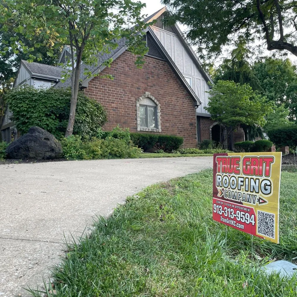 Slide of True Grit Roofing Company