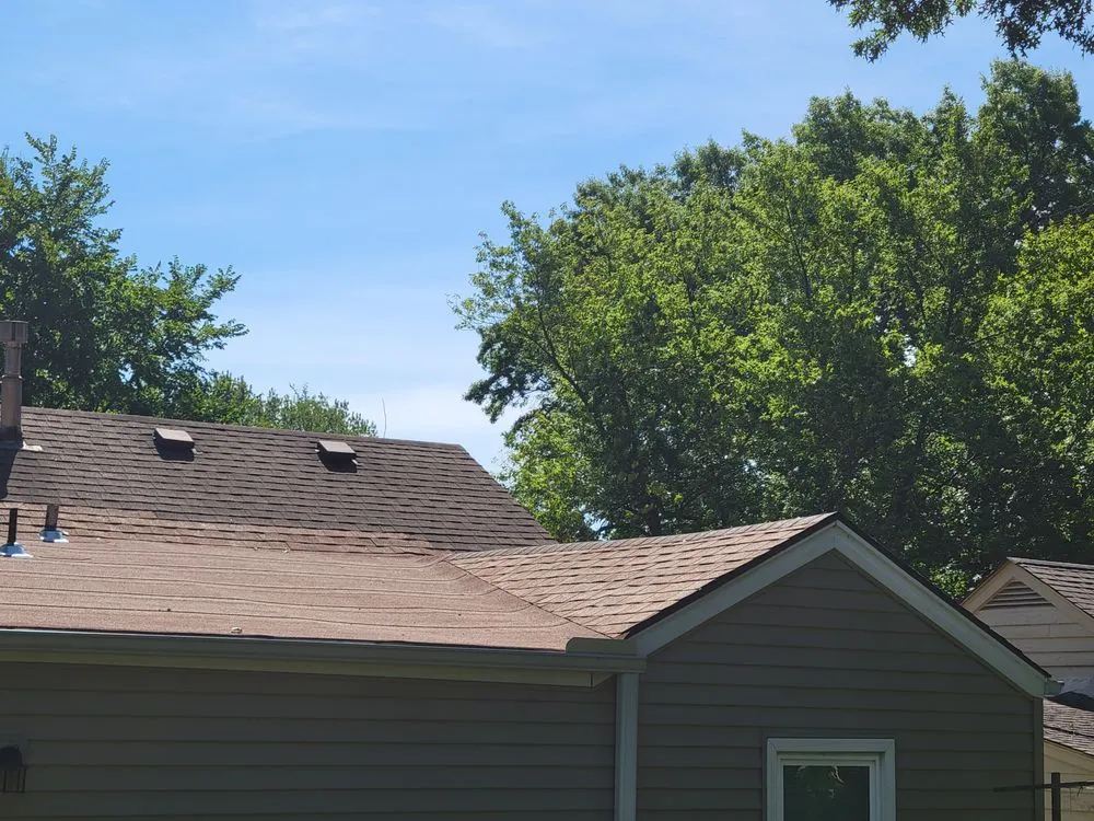 Slide of True Grit Roofing Company