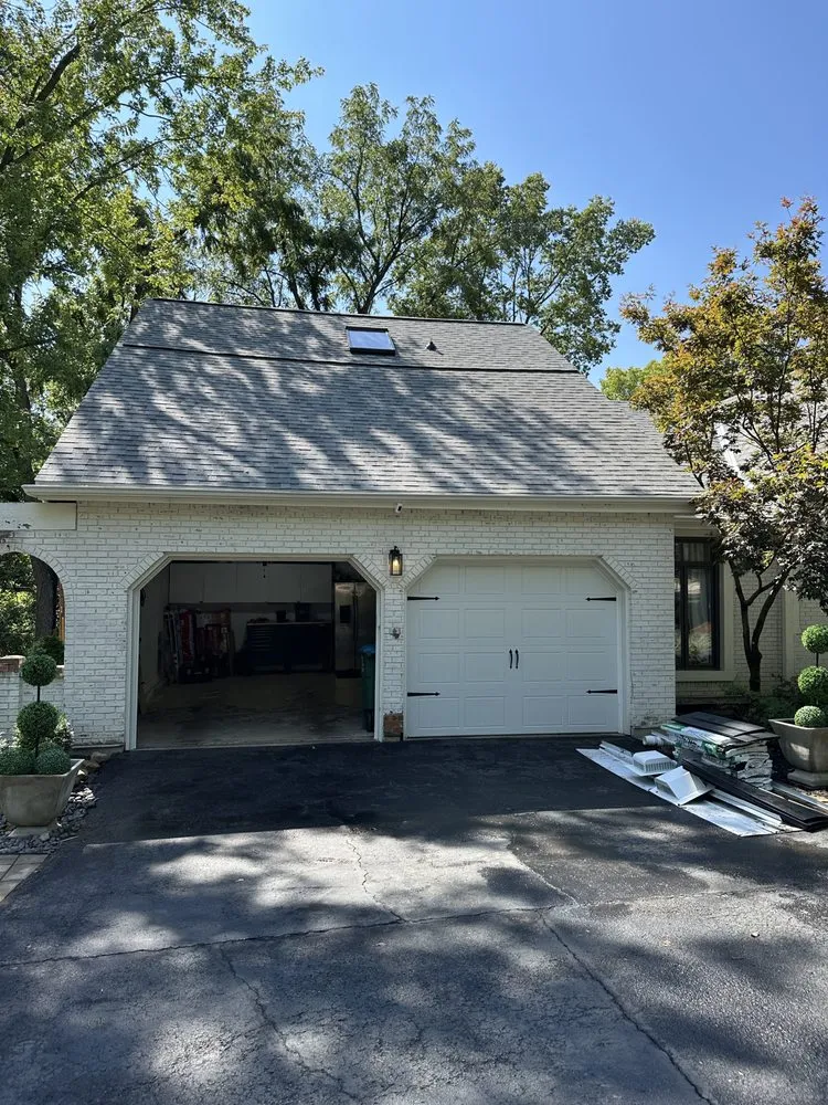 Slide of True Grit Roofing Company