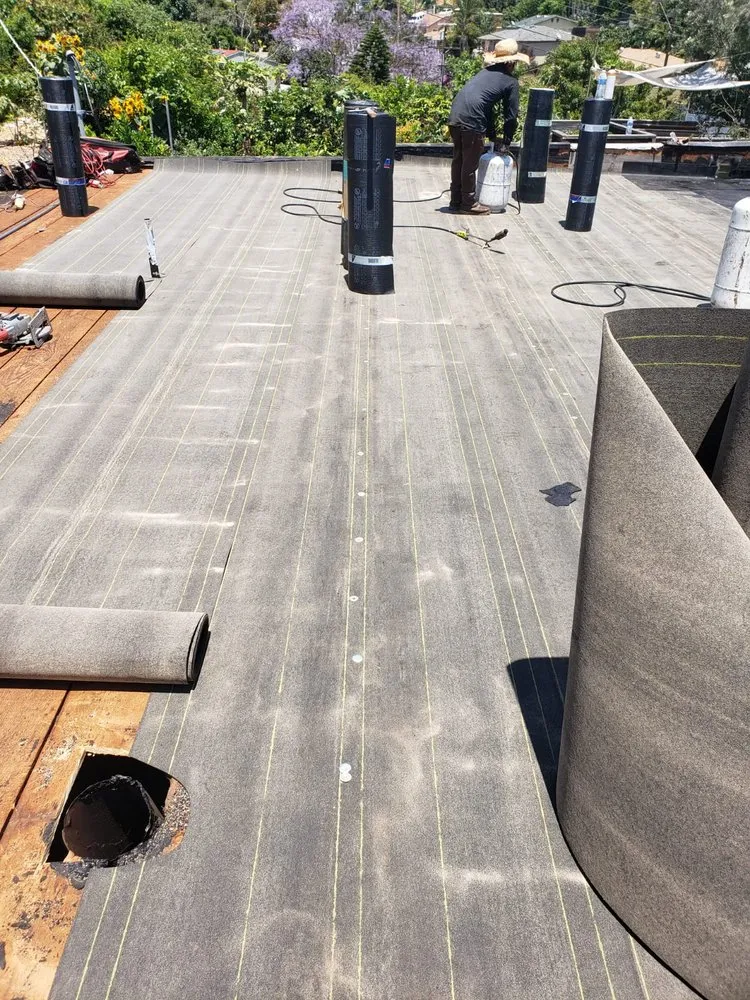 Slide of Trujano Roofing