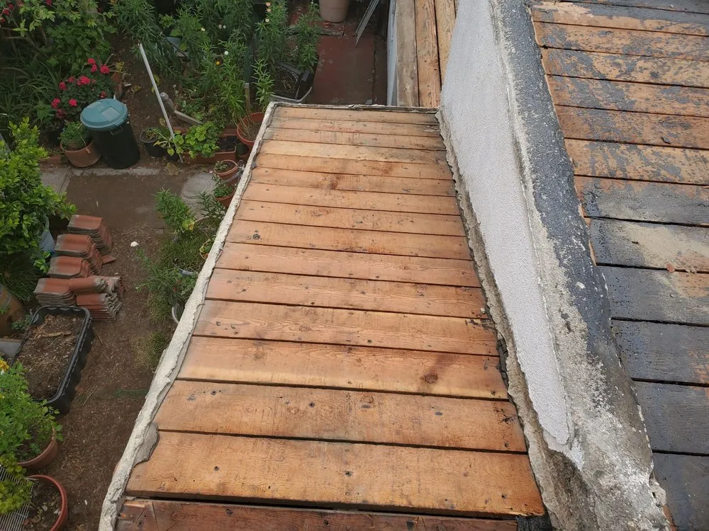 Slide of Trujano Roofing