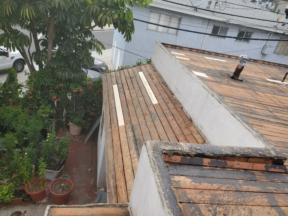 Slide of Trujano Roofing